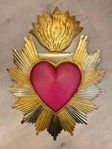 Corazón sagrado una flama