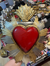 Corazón sagrado una flama