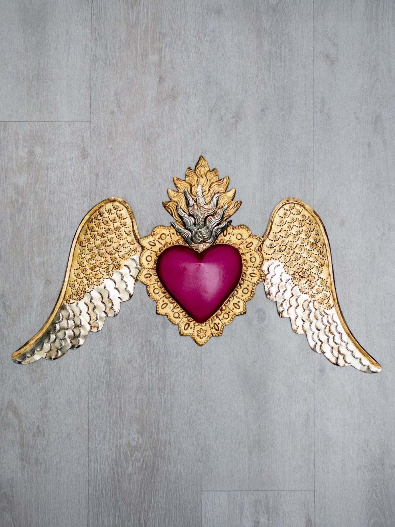 Corazón alado abajo doble flama