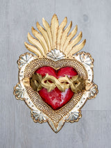 Corazón flama con espinas