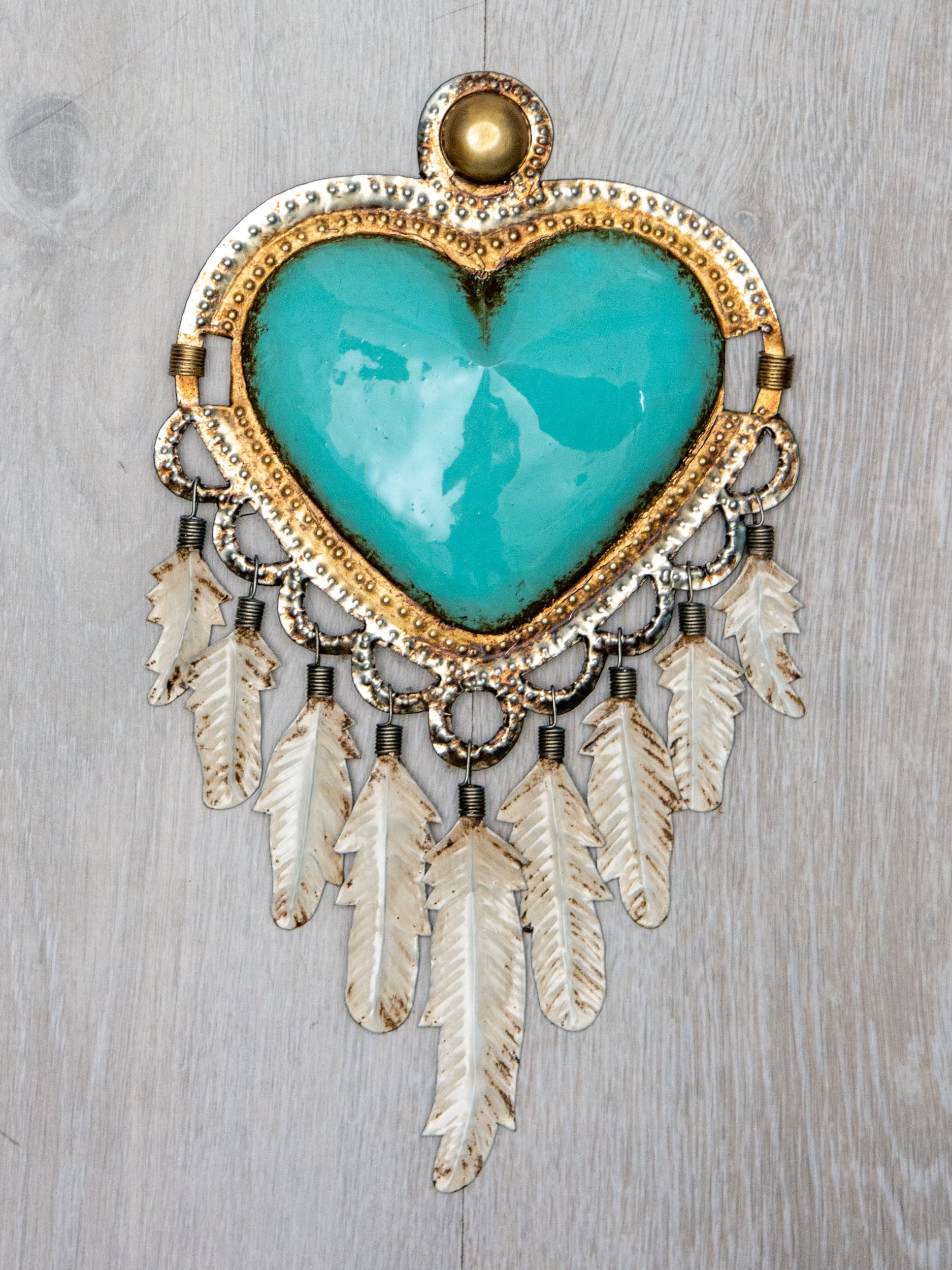 Corazón plumas colgantes