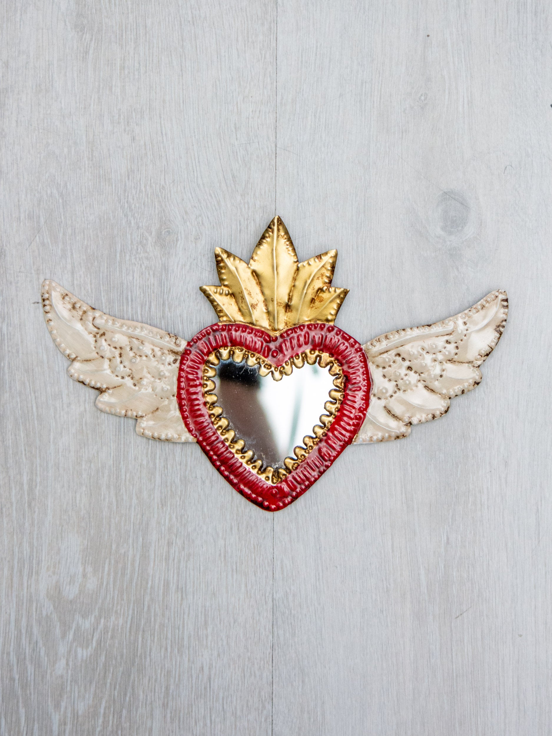 Corazón alado con espejo chico