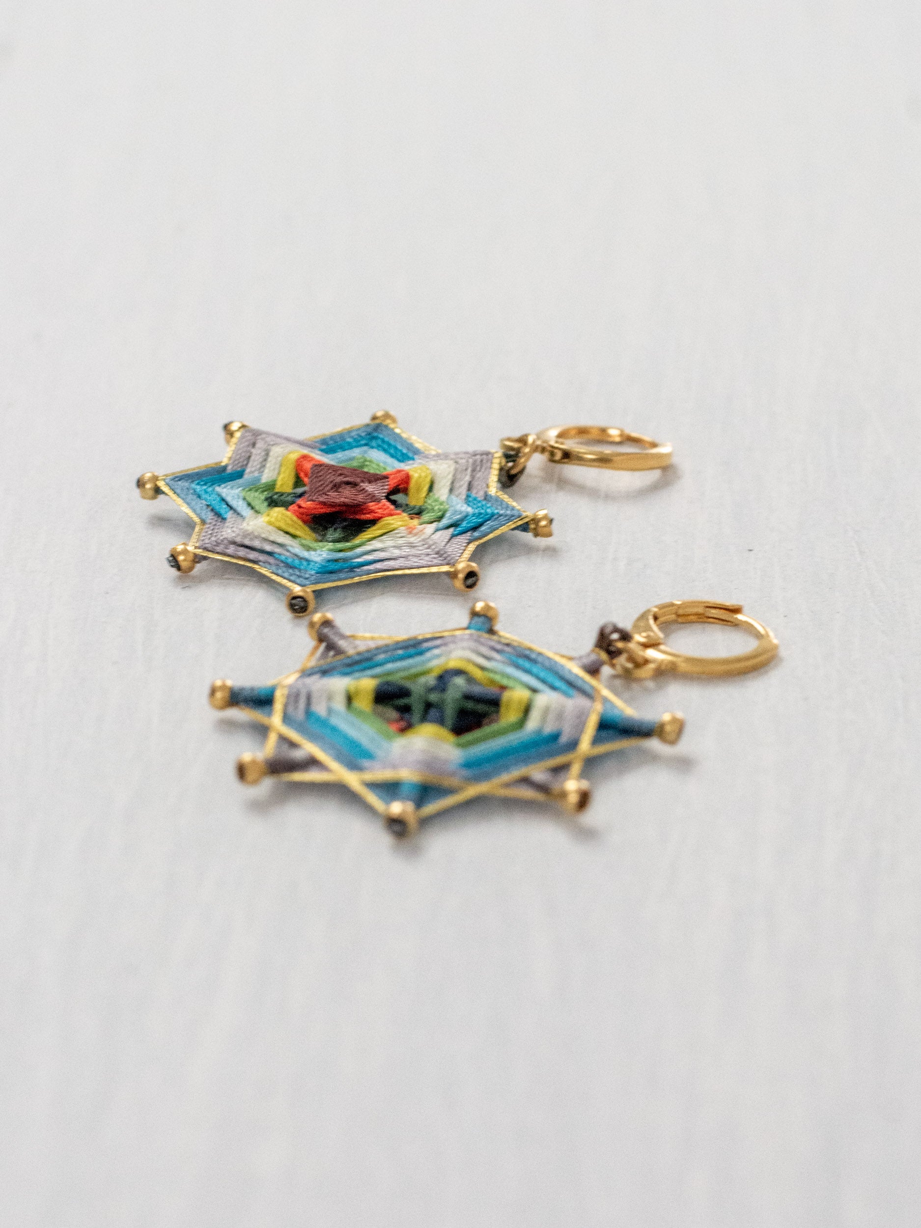 Aretes mandala estrella chicos