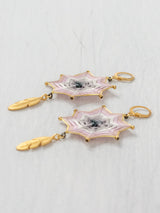 Aretes mandala estrella con plumas grandes
