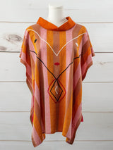 Poncho largo ajustable de flechas San Cristóbal