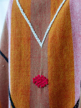 Poncho largo ajustable de flechas San Cristóbal