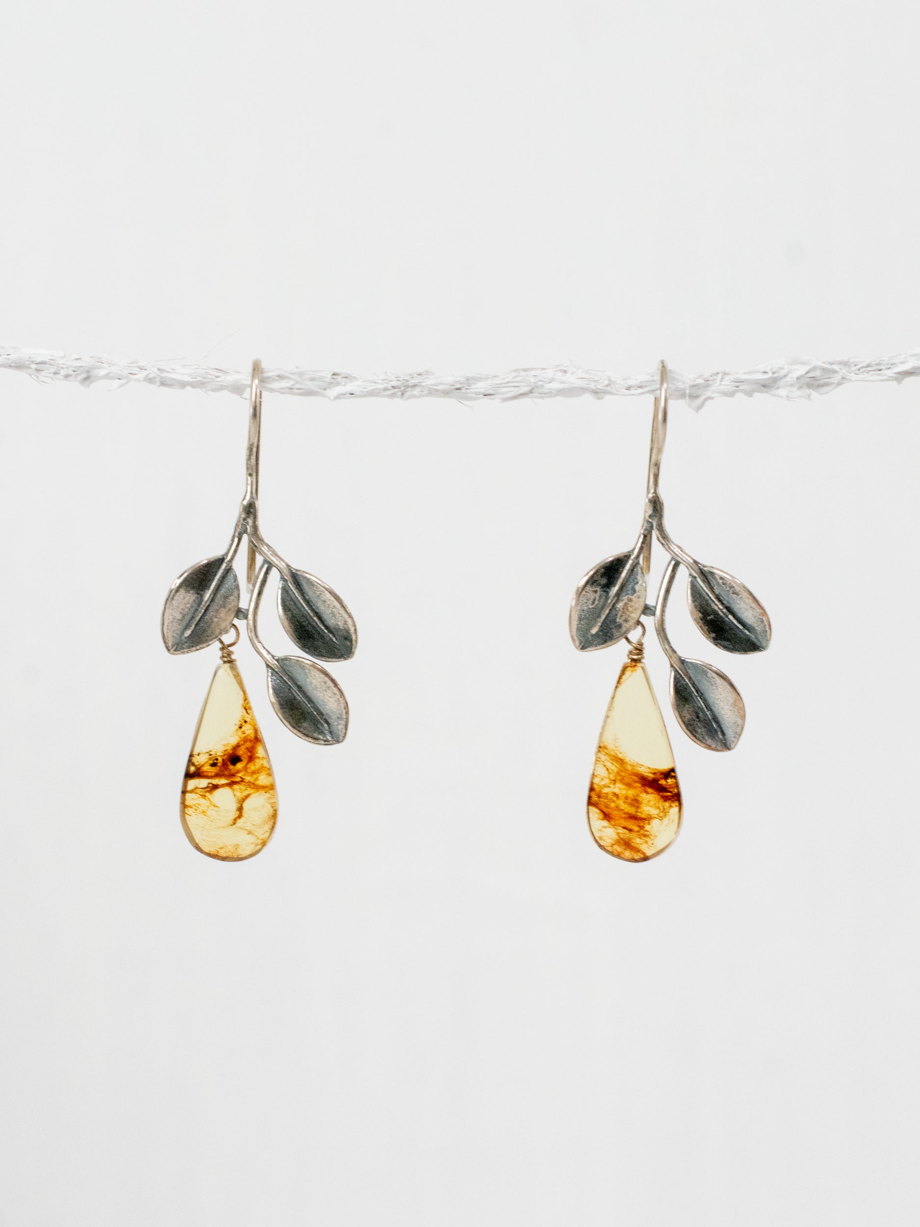 Aretes de tres manglares ganchos