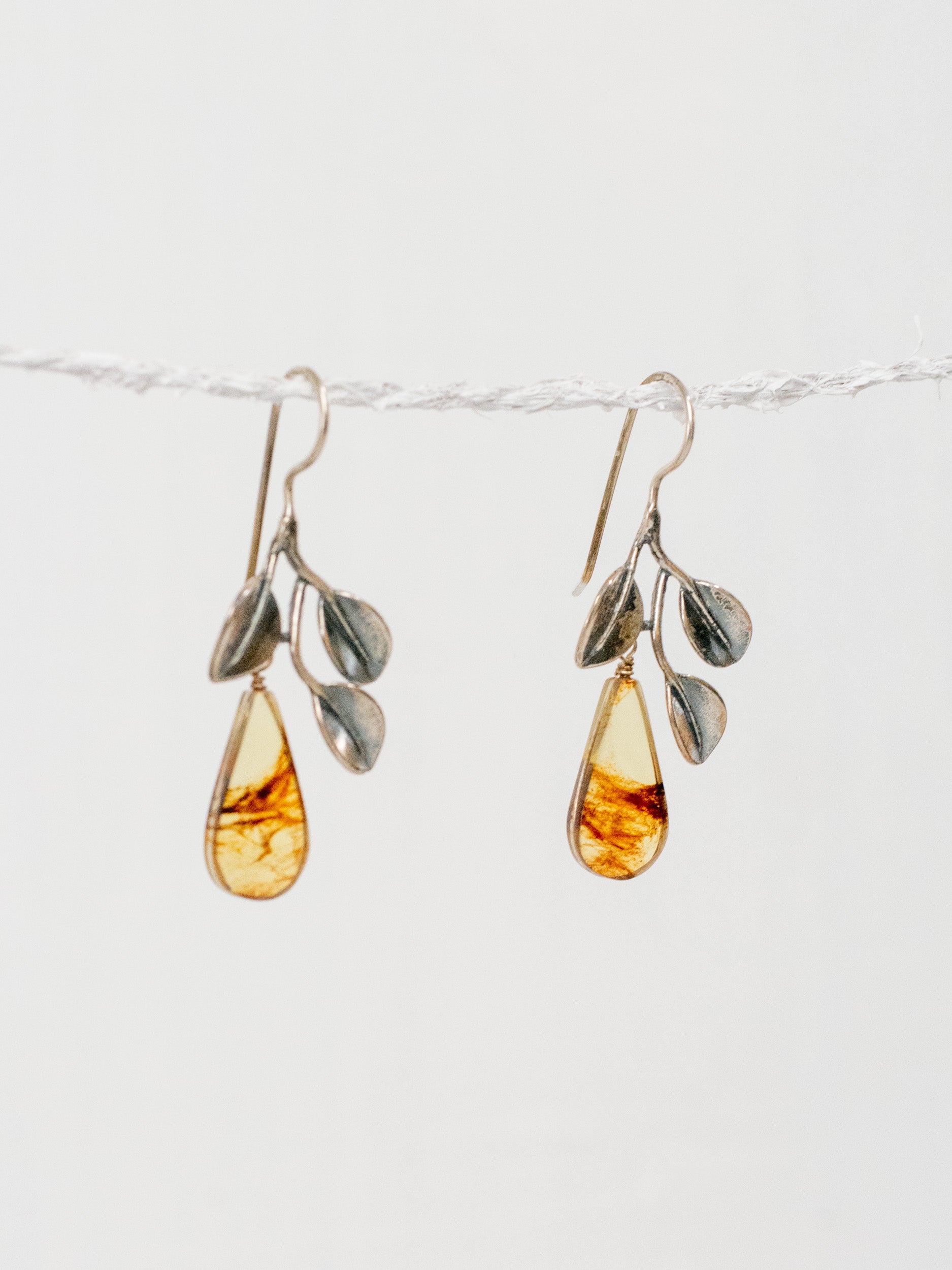 Aretes de tres manglares ganchos