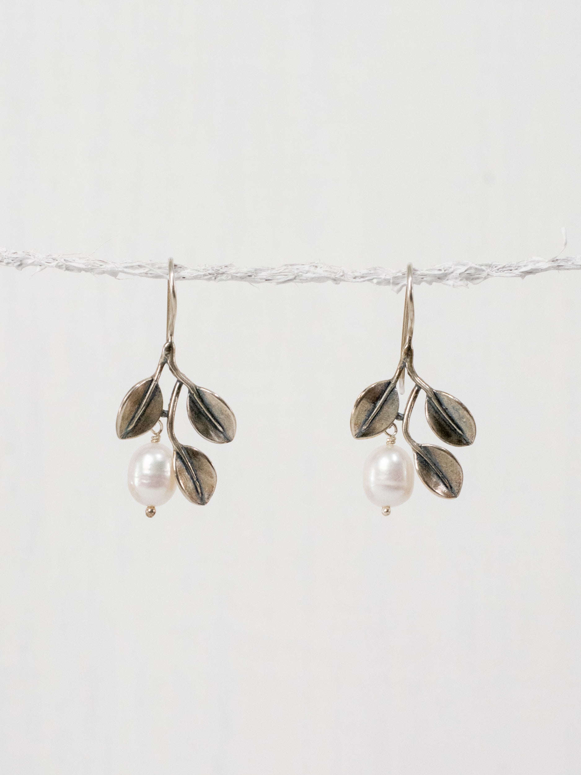 Aretes de tres manglares ganchos