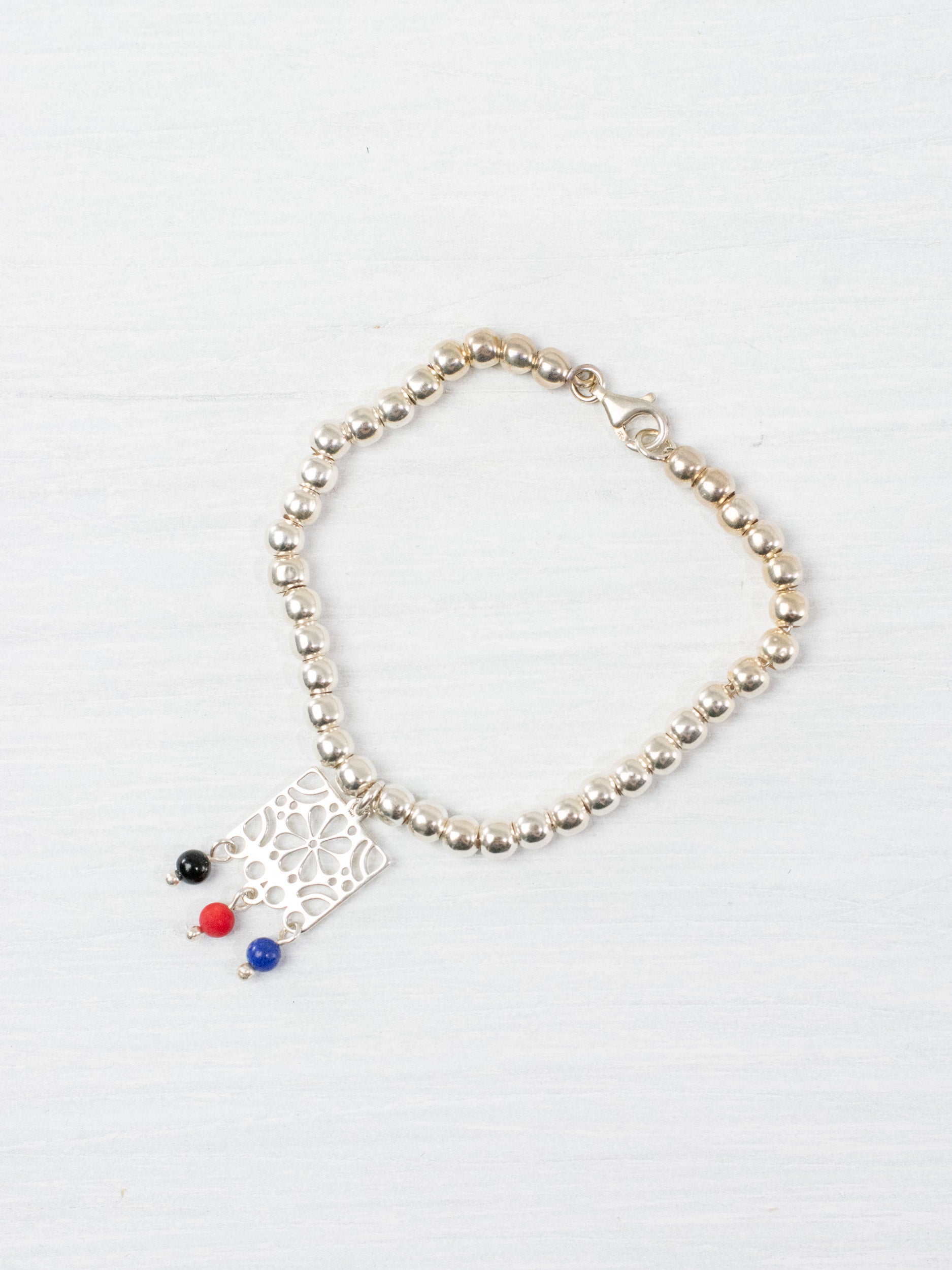 Pulsera papel picado con flor