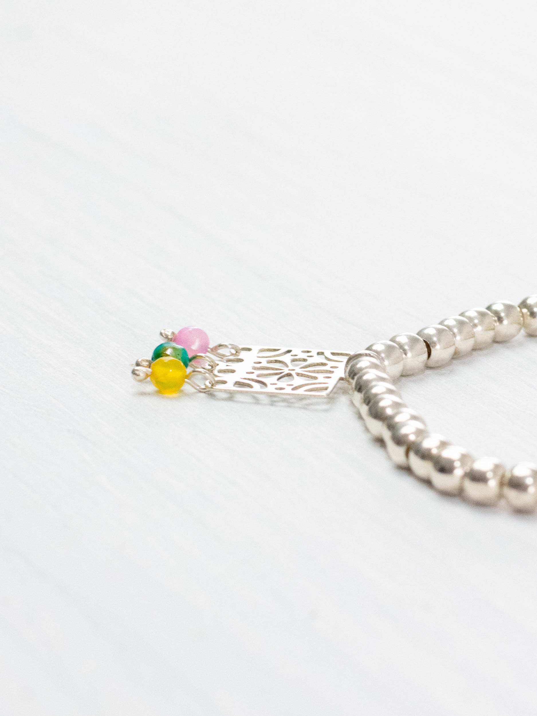 Pulsera papel picado con flor