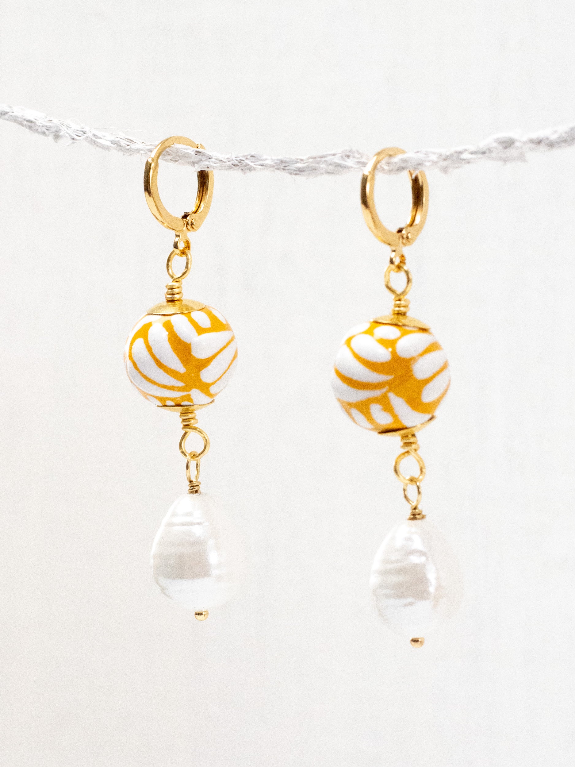 Aretes talavera esferas con perlas