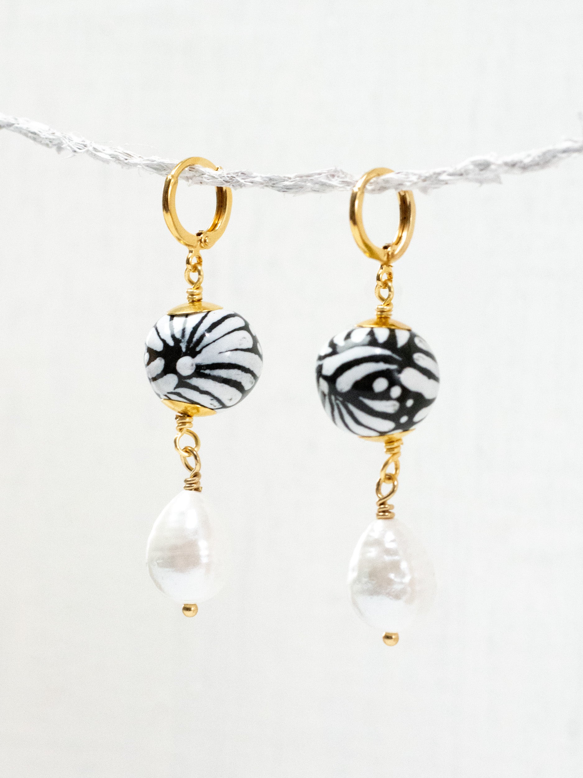 Aretes talavera esferas con perlas