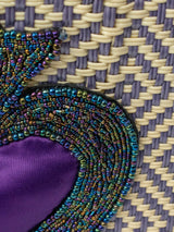 Bolsa artesanal corazón milagro mediana con pompón de flor