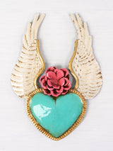 Winged heart with a flower